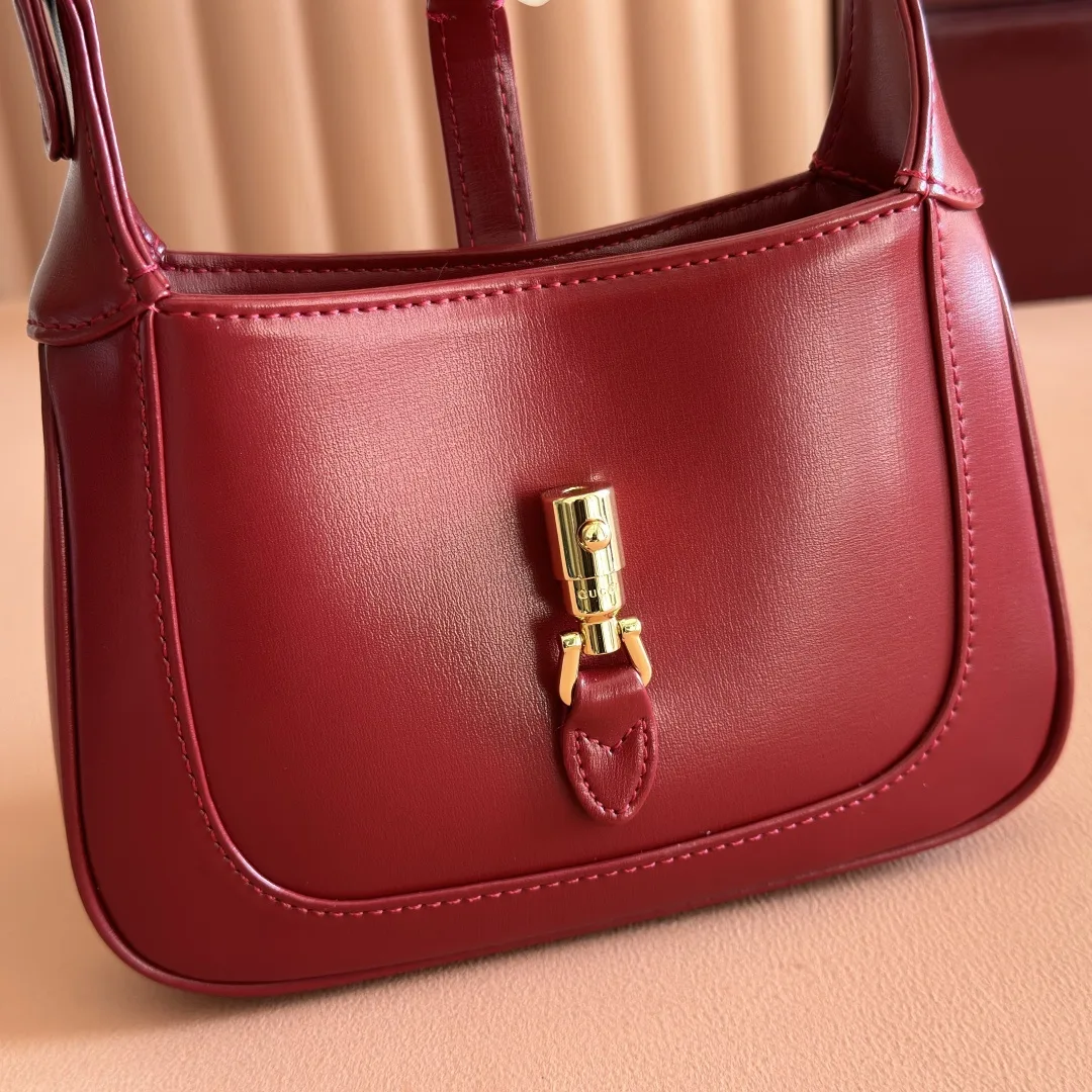 Gucci Canvas and Leather Jackie Shoulder Bag product photo from LabelPicks