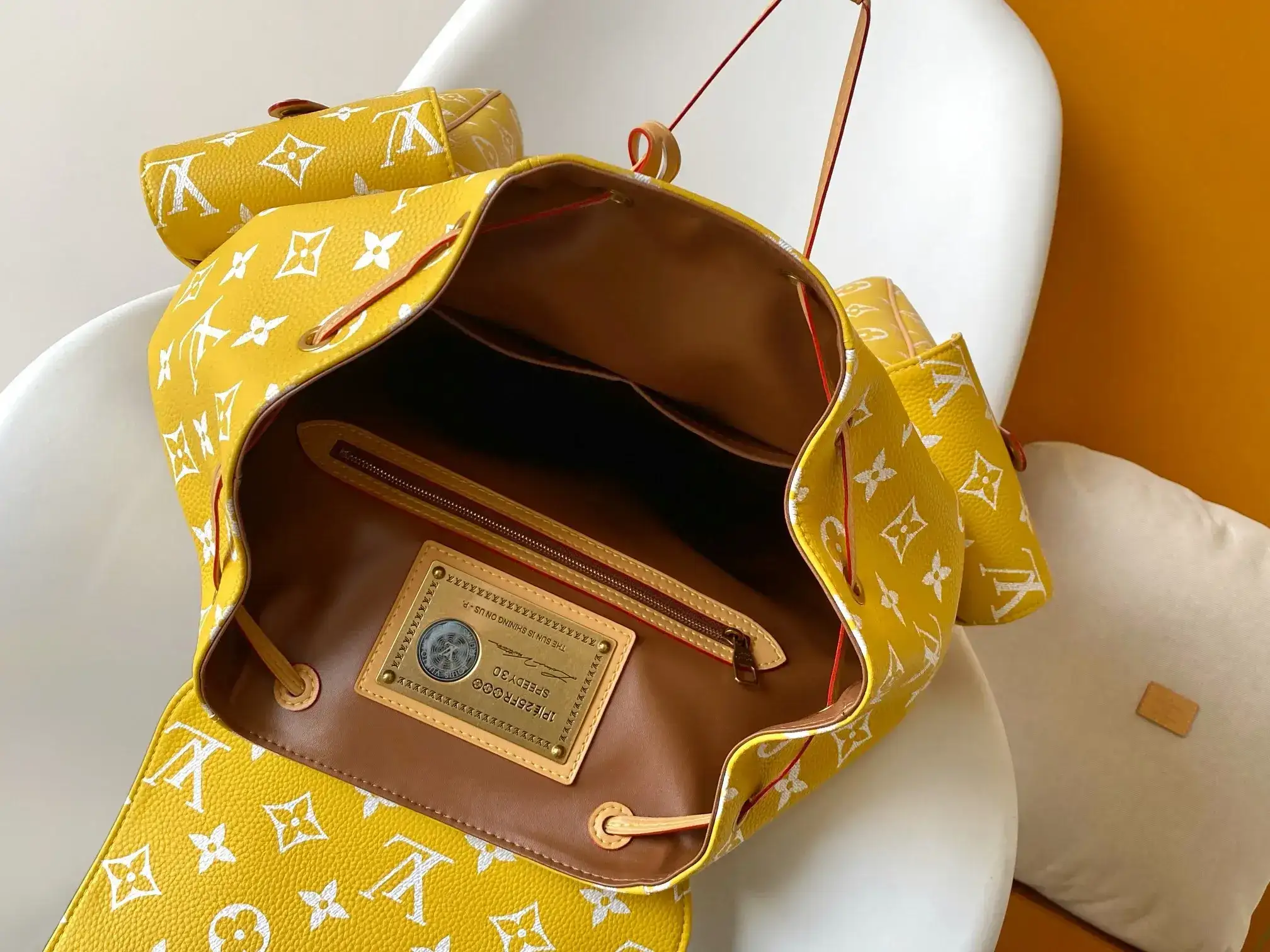 Louis Vuitton Christopher Yellow Monogram Canvas Backpack product photo from LabelPicks