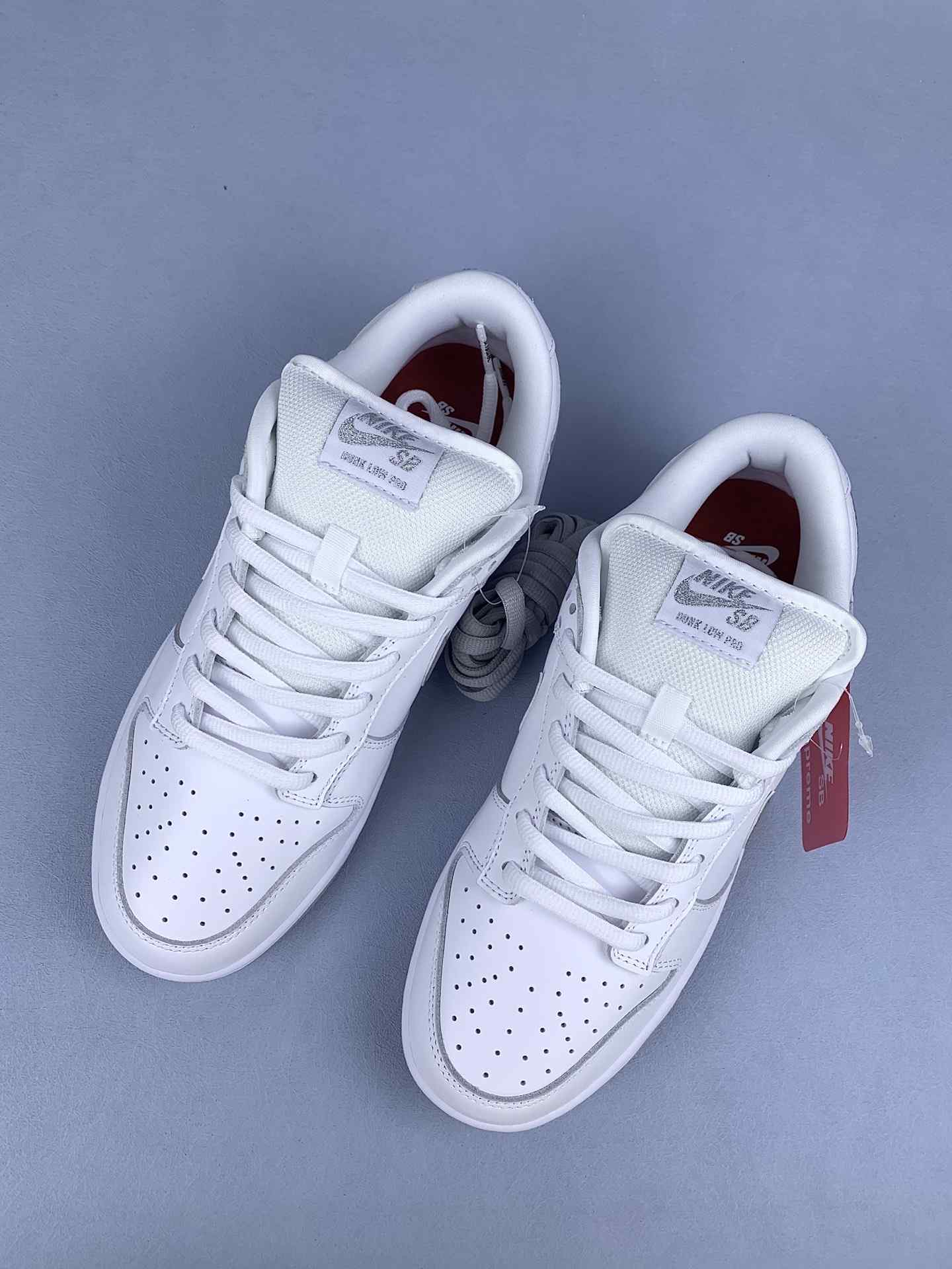 Supreme x Nike SB Dunk Low OG QS Shoes