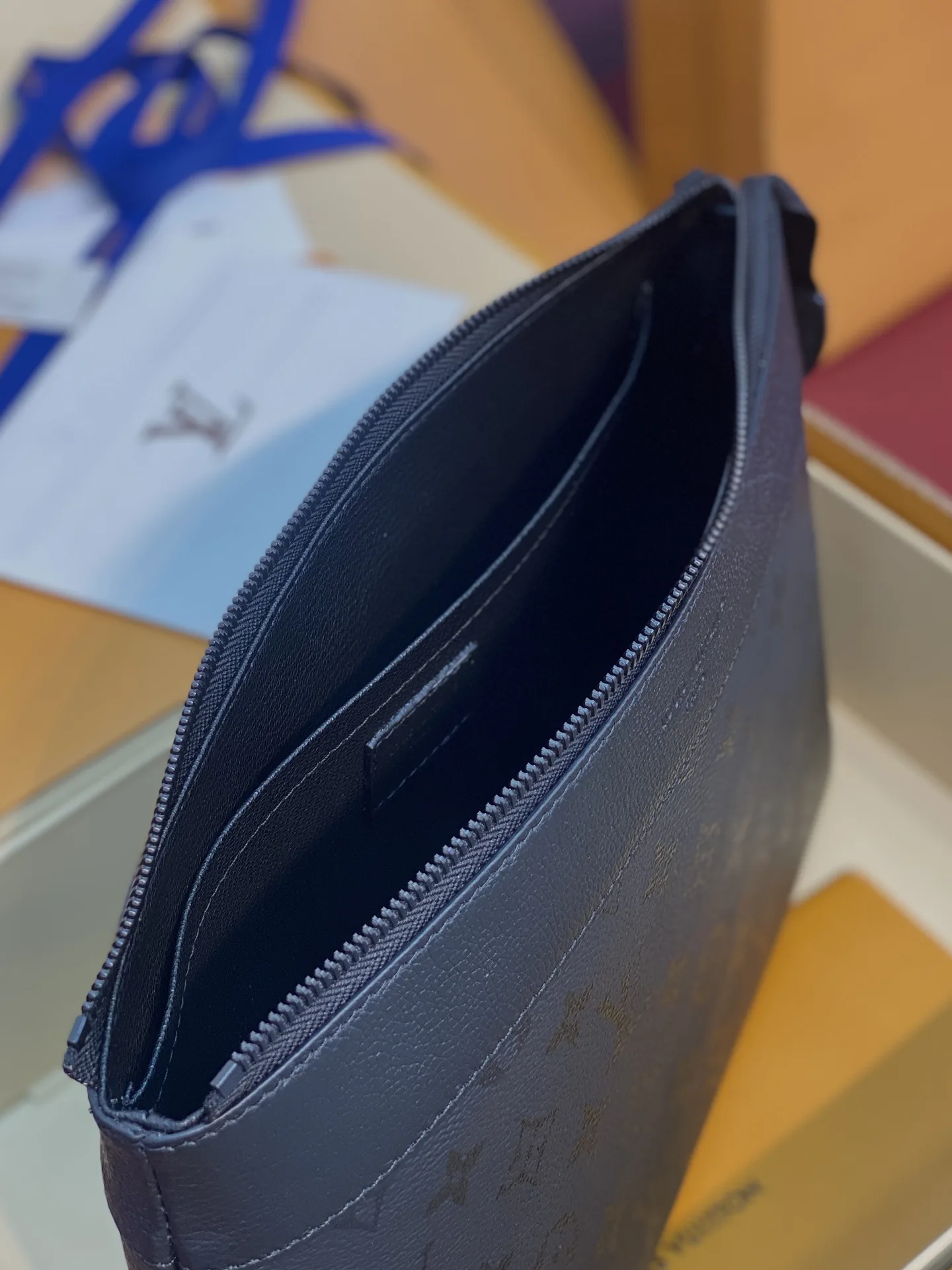Louis Vuitton Black Pochette Canvas and Leather Clutch product photo from LabelPicks