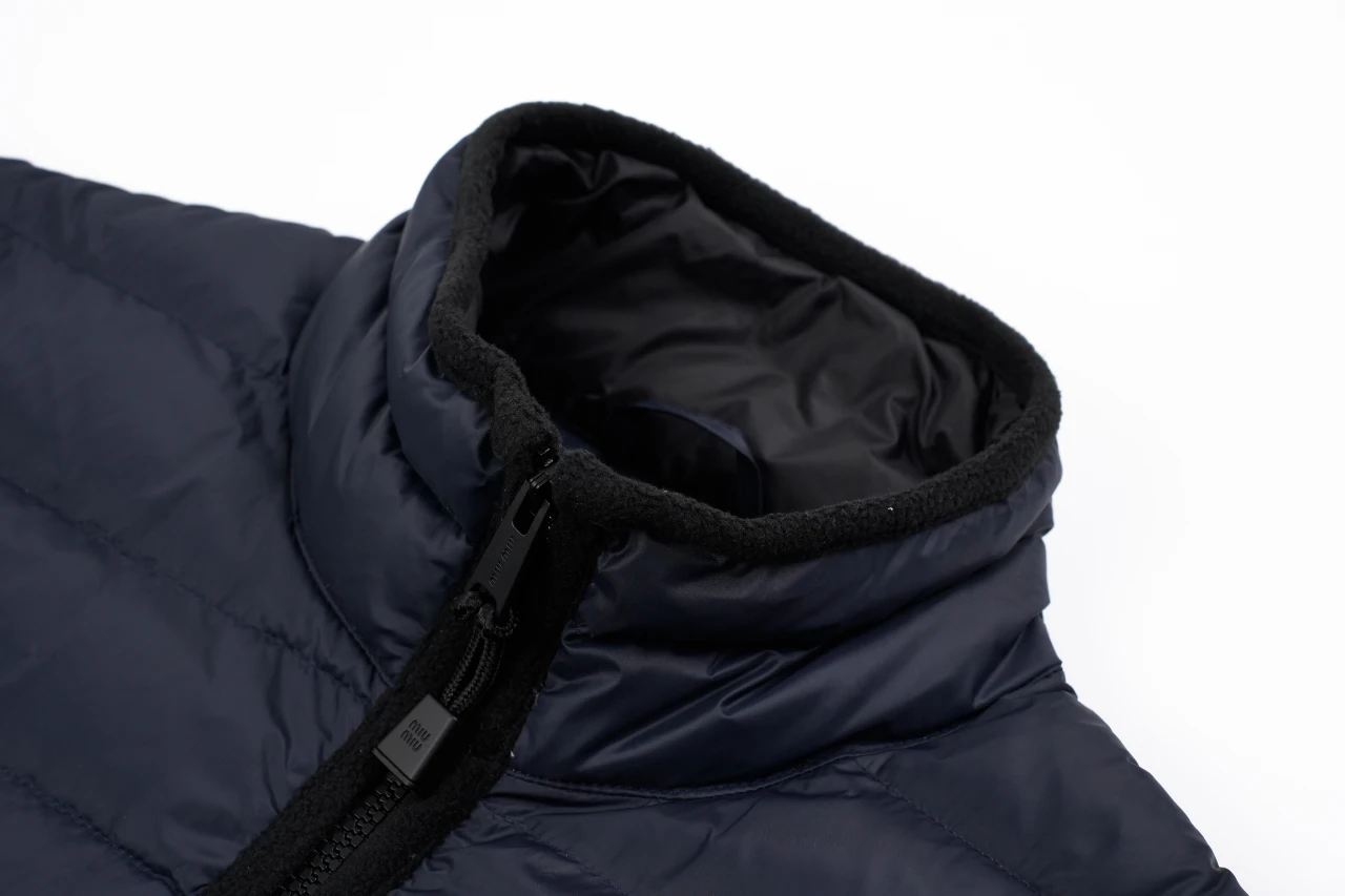 Miu Miu Navy Logo Quilted Down Vest product photo from LabelPicks
