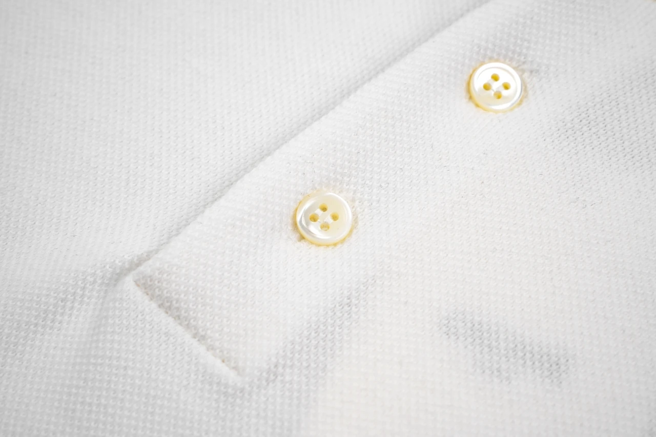 CELINE White Mini Letter Logo Polo Shirt product photo from LabelPicks