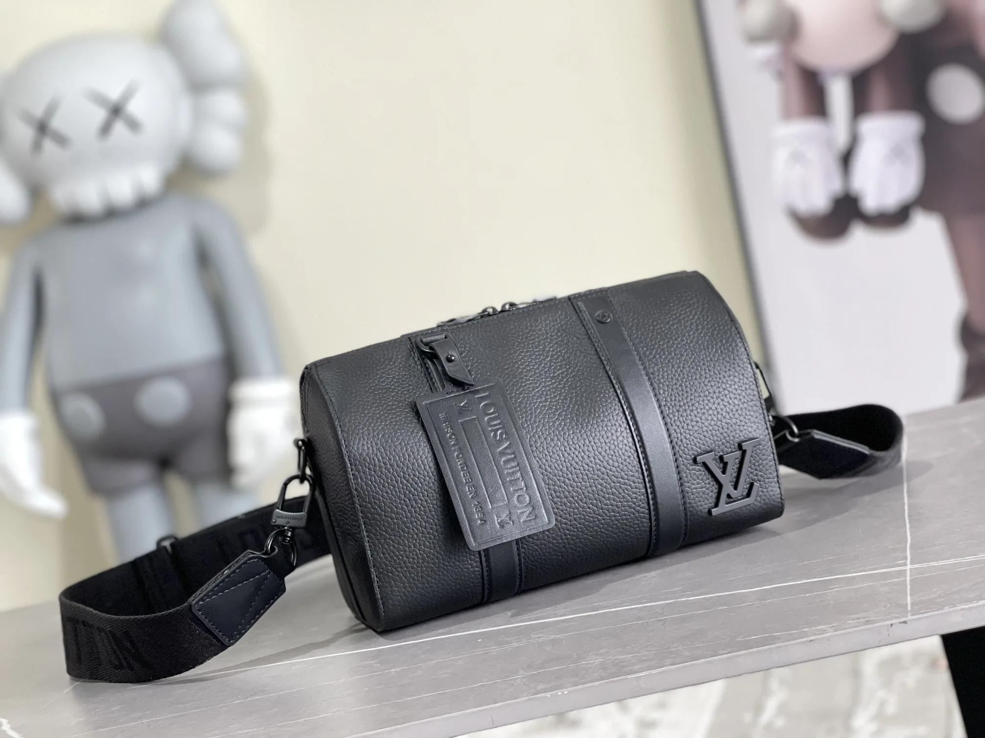 Louis Vuitton Grained Leather Keepall Crossbody Bag product photo from LabelPicks