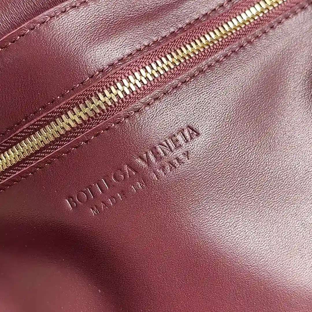 Bottega Veneta Cassette Burgundy Intrecciato Woven Leather Shoulder Bag product photo from LabelPicks