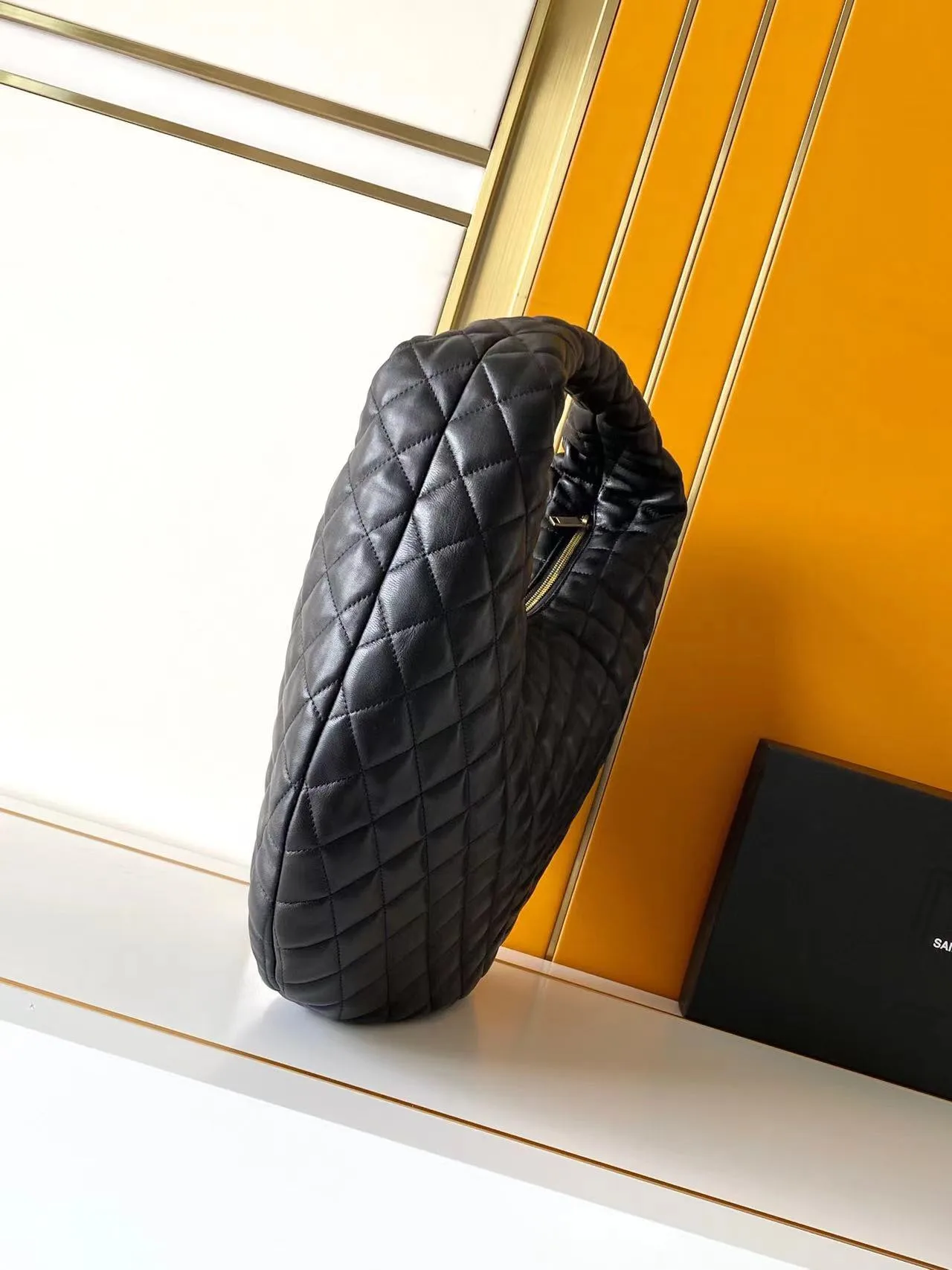 Saint Laurent Lambskin Icare Hobo Bag product photo from LabelPicks