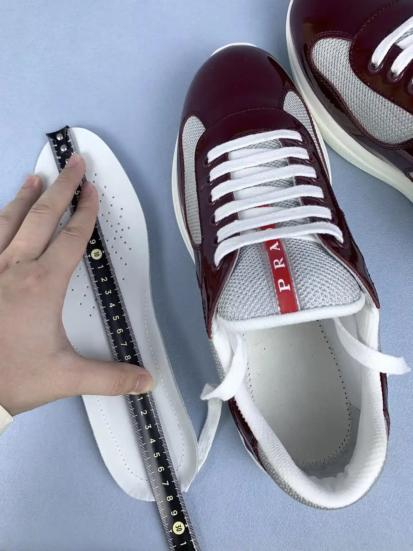 Patent leather and technical fabric Prada America's Cup sneakers product photo from LabelPicks