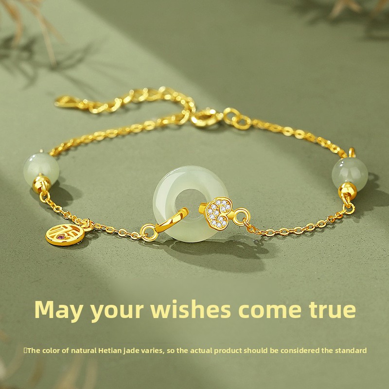 Original design, featuring a “Fu” character and a peace symbol, in a pure silver bracelet with a Chinese-style design, incorporating Hetian jade and 18K gold accents