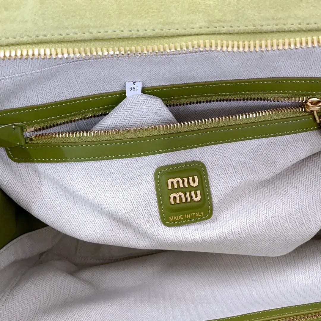 Miu Miu Canvas and Leather Crossbody Bag product photo from LabelPicks