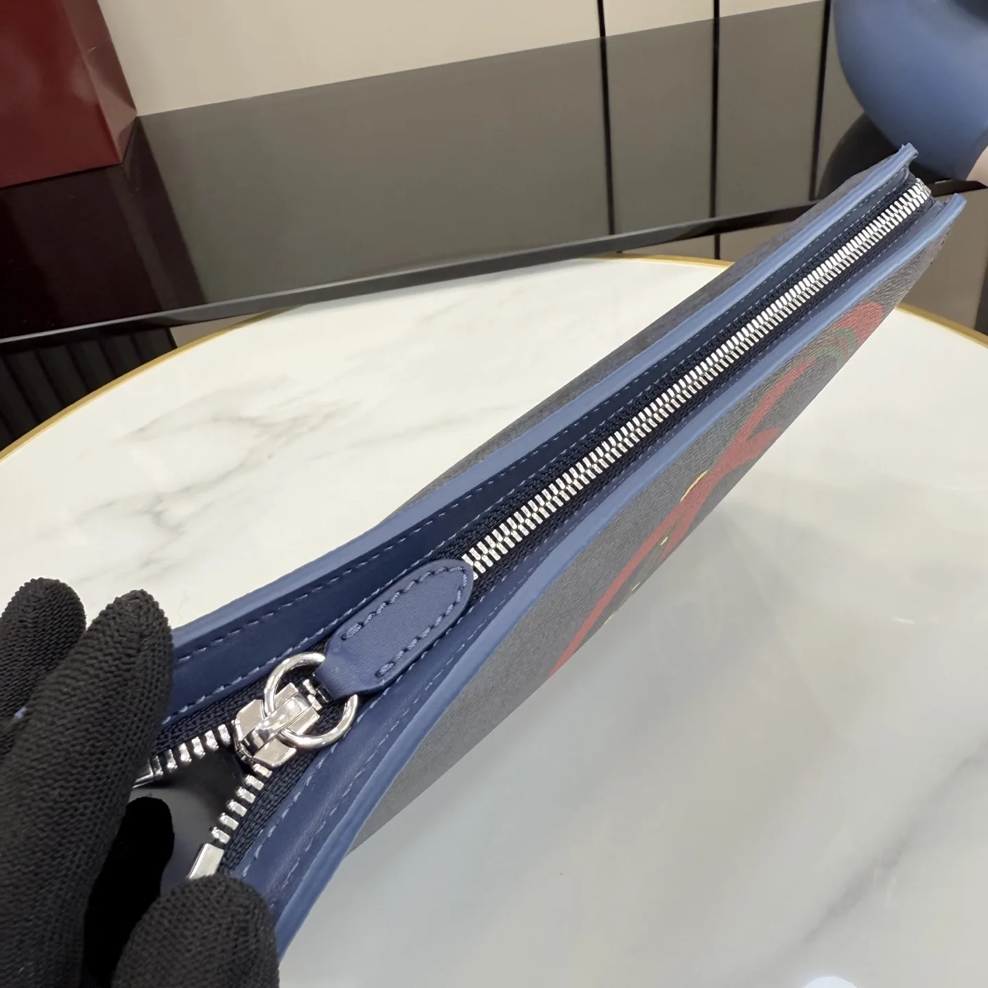 Gucci Navy GG Supreme Canvas Clutch product photo from LabelPicks