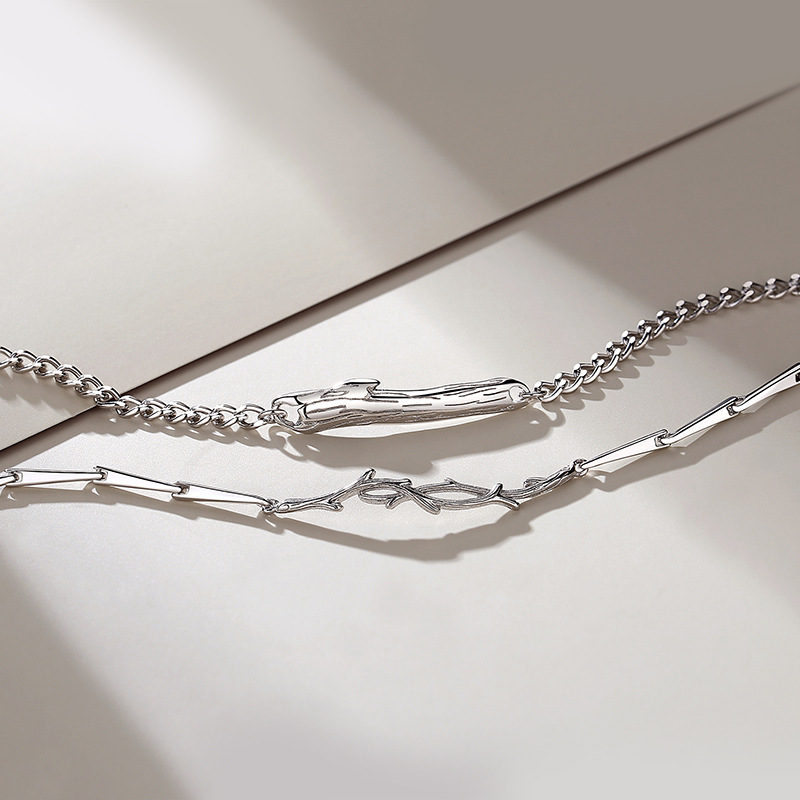A mountain with trees, trees with branches – a pair of sterling silver couple bracelets featuring a minimalist, forest-inspired design with a unique and original aestheticAvailable for drop shipping