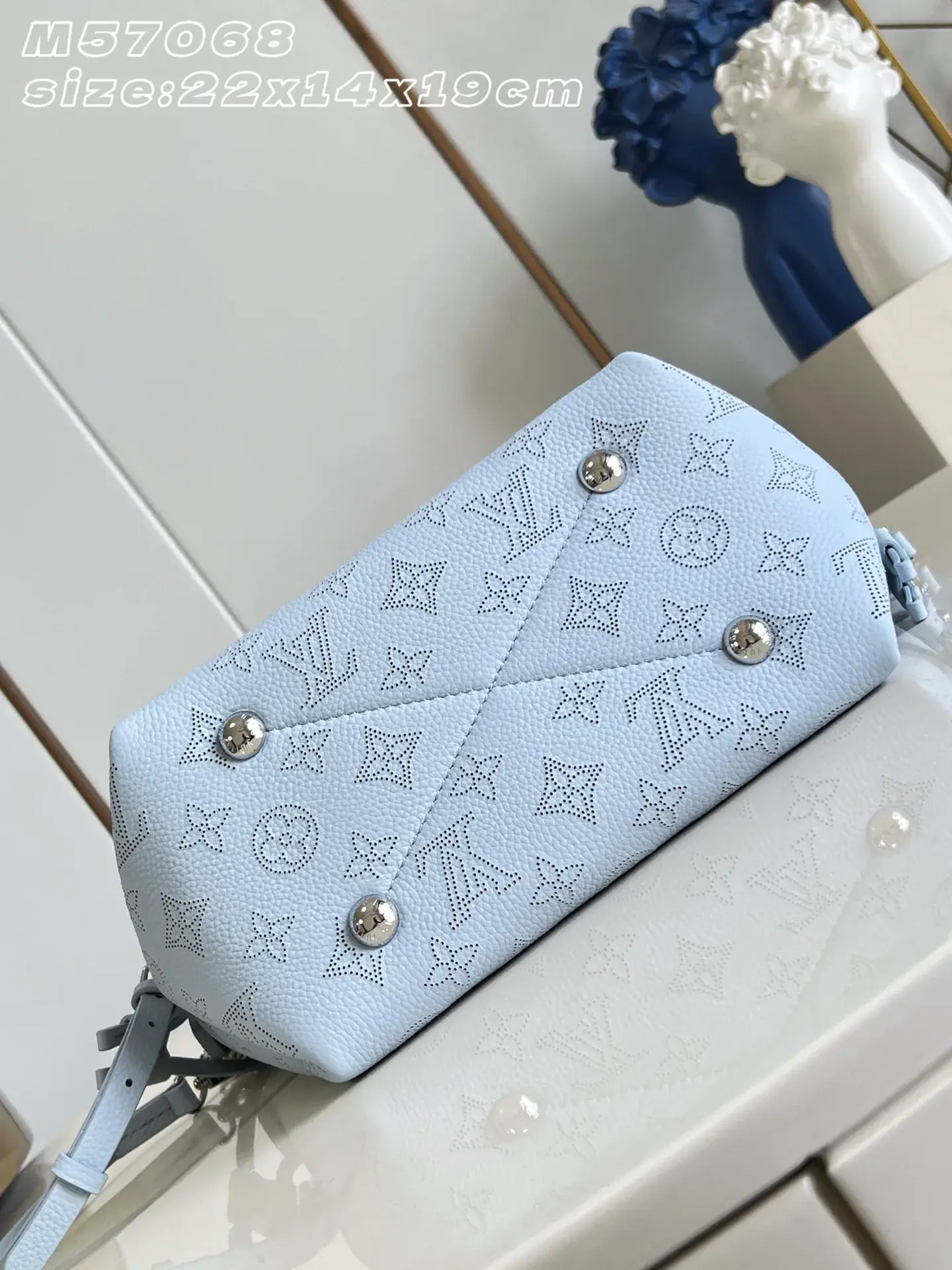 Louis Vuitton Woven Leather Bucket Bag product photo from LabelPicks