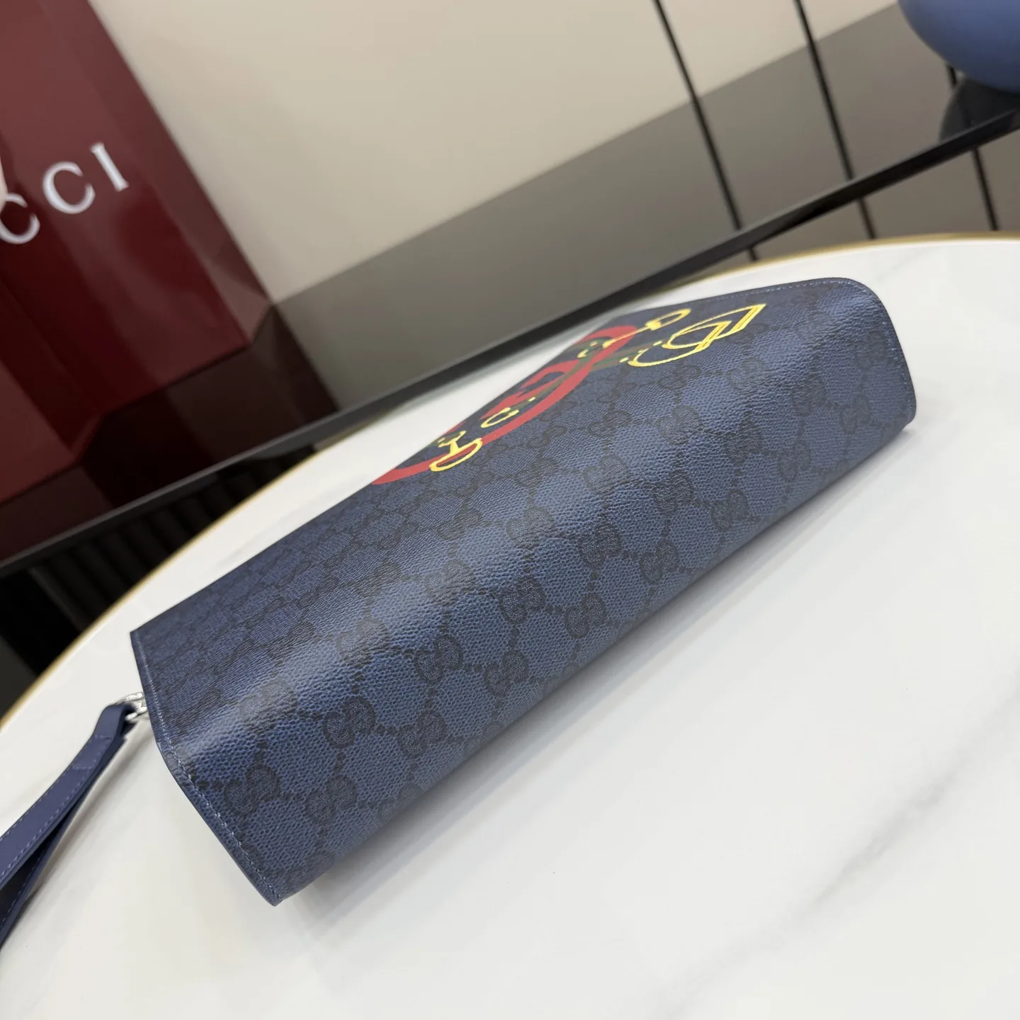 Gucci Navy GG Supreme Canvas Clutch product photo from LabelPicks