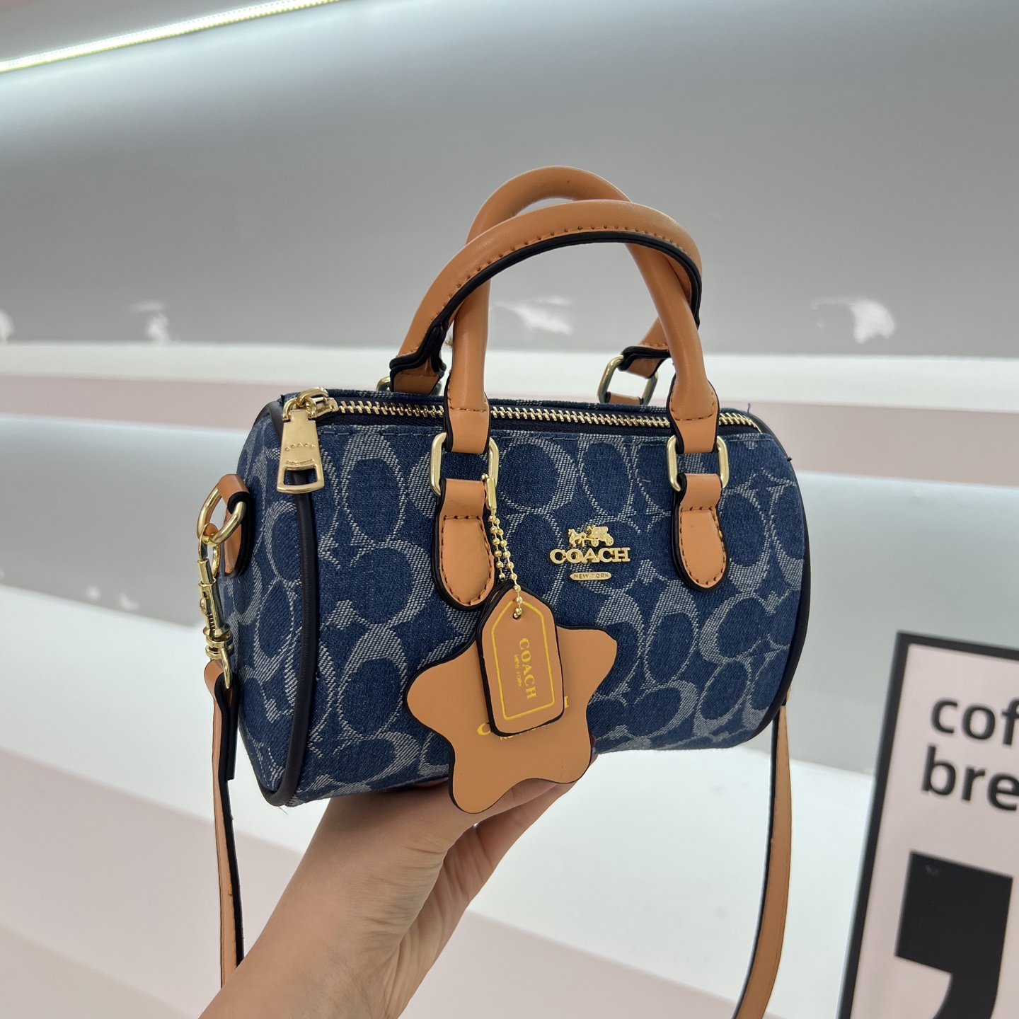 Coach denim pillow bag