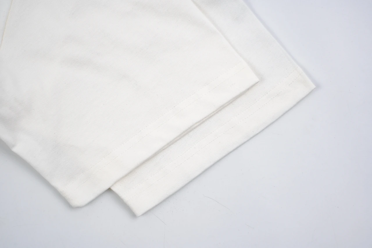 Louis Vuitton White Raffia Badge T-Shirt product photo from LabelPicks