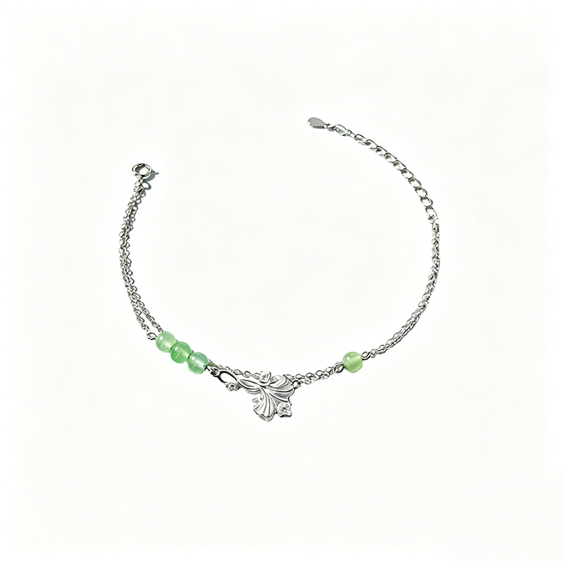 Sansheng has an apricot green stone bracelet, a 999 pure silver retro Chinese-style bracelet, a literary and artistic, lightweight, and luxurious piece of jewelry