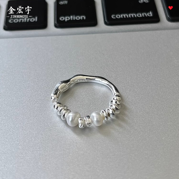 925 sterling silver pearl ring with silver accents, a unique and stylish design for women, exuding a sense of understated luxury, perfect for the index finger, and in an Instagram-inspired style