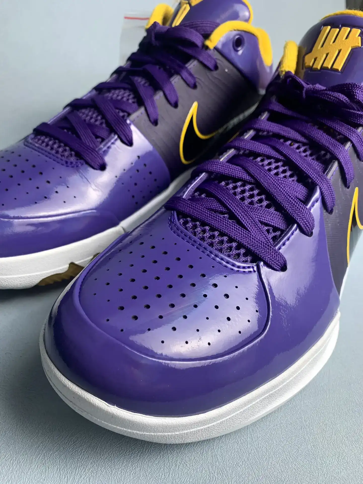 UNDEFEATED x Kobe 4 Protro “Lakers” Basketball Shoes product photo from LabelPicks