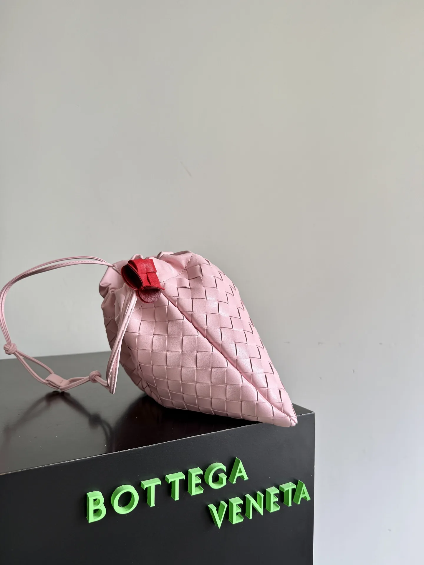 Bottega Veneta Pink Dustbag Intrecciato Woven Leather Bucket Bag product photo from LabelPicks