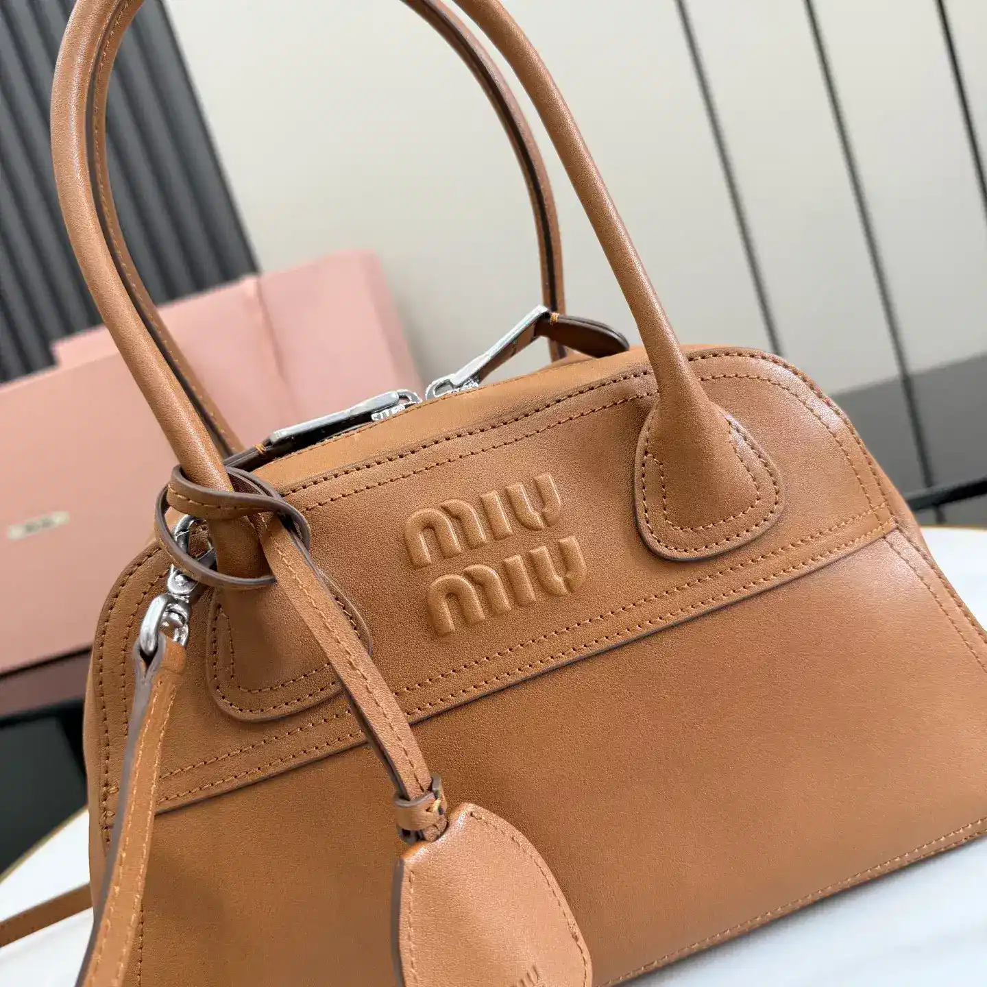 Miu Miu Lambskin Vivant Top Handle Bag product photo from LabelPicks