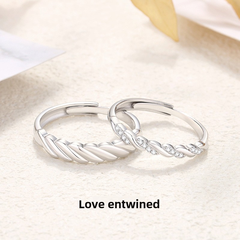 s925 sterling silver, a pair of rings with a romantic and intertwined design, featuring a unique twist pattern, exuding a sophisticated and trendy aesthetic