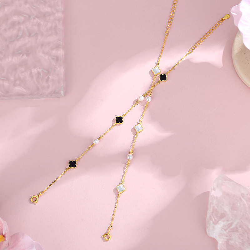 S925 sterling silver, featuring a small lucky four-leaf clover charm, a delicate and sweet bracelet in a forest-inspired style, perfect as a birthday gift for your girlfriend