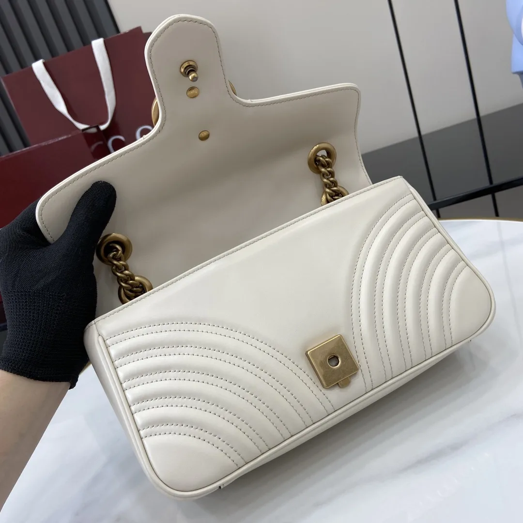 Gucci Marmont White GG Supreme Canvas Shoulder Bag product photo from LabelPicks