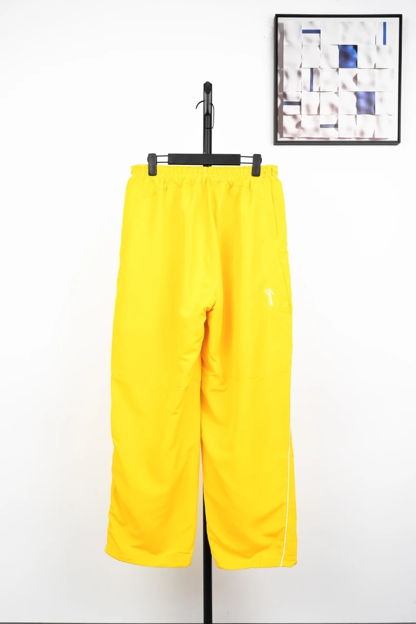 Nike Bright Yellow Swoosh Track Pants product photo from LabelPicks