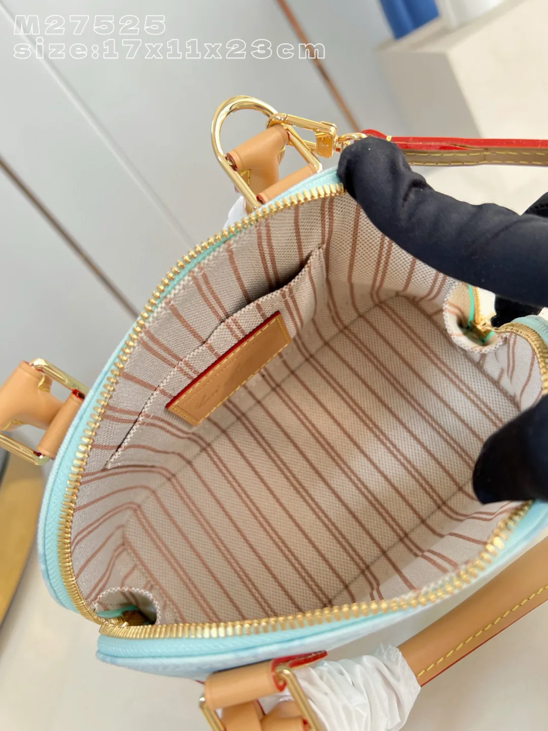 Louis Vuitton Canvas and Leather Alma Top Handle Bag product photo from LabelPicks