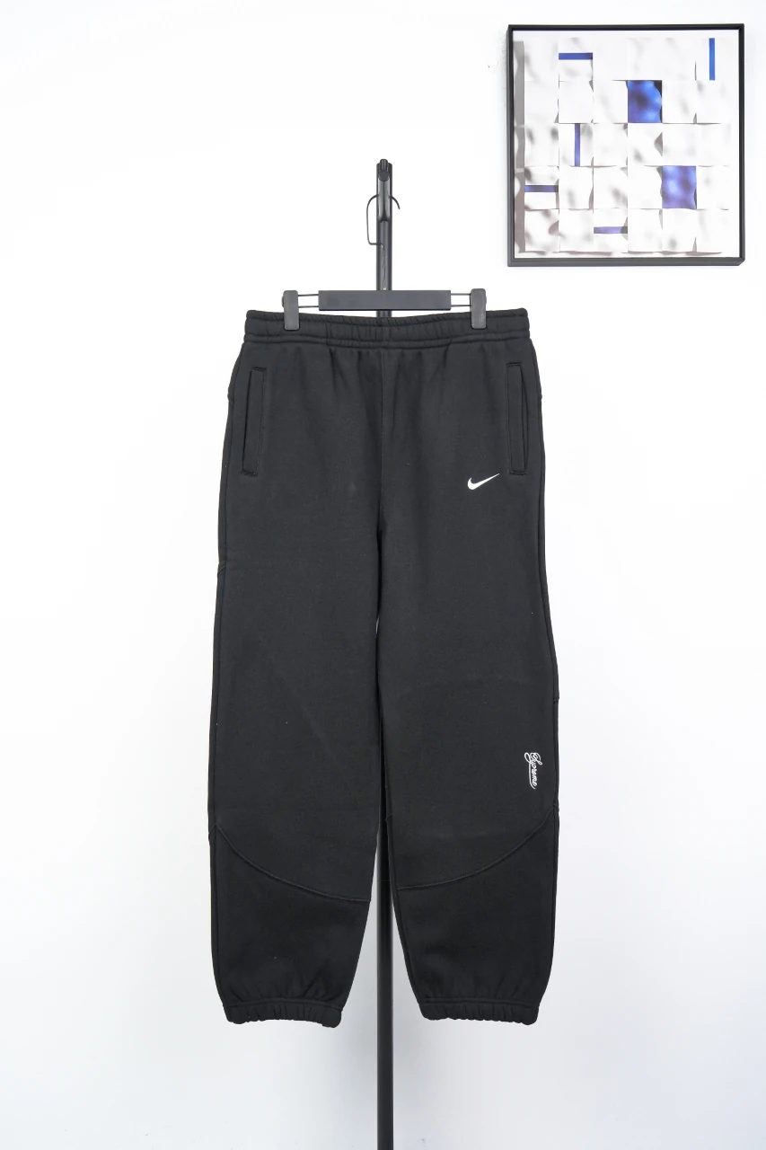 Nike Black Swoosh Embroidered Track Pants product photo from LabelPicks