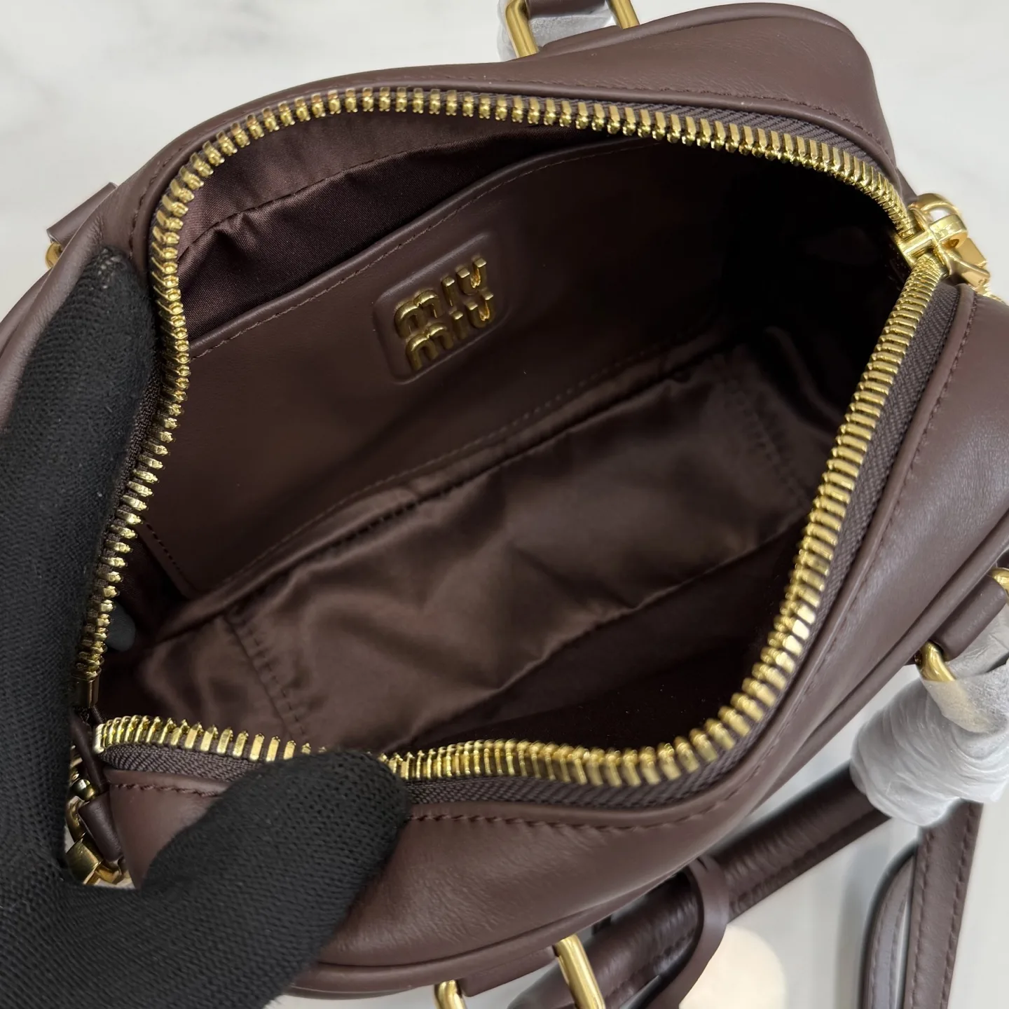 Miu Miu Calfskin Matelasse Top Handle Bag product photo from LabelPicks