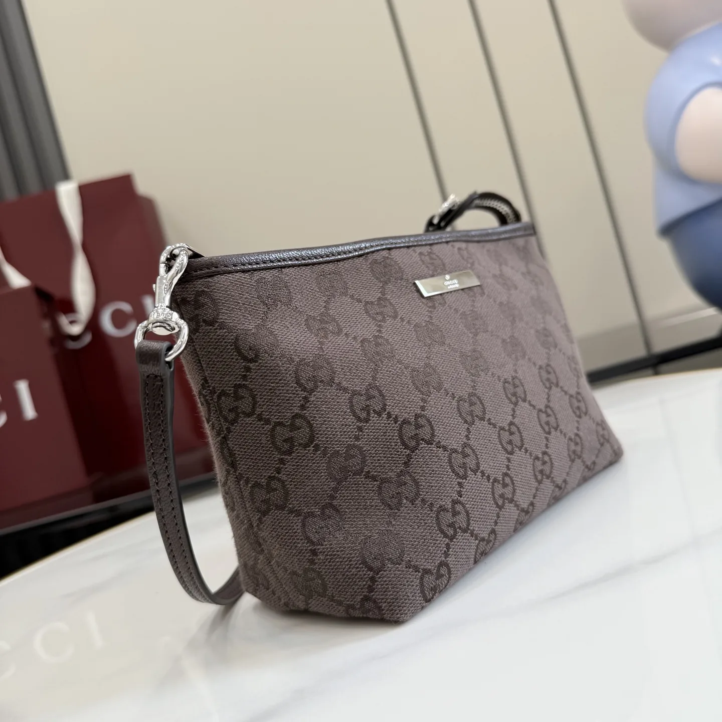 Gucci Brown Generation Canvas and Leather Clutch product photo from LabelPicks