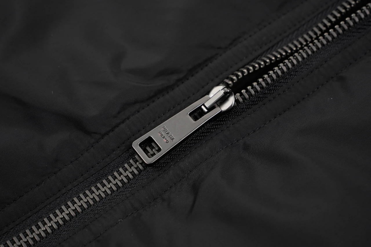 Prada Black Hooded Nylon Down Jacket with Metal Triangle Logo product photo from LabelPicks