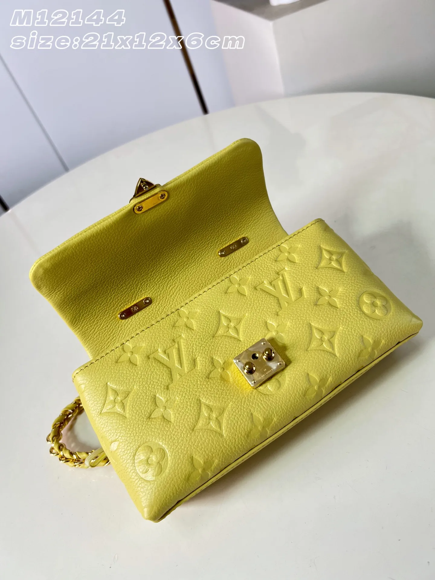 Louis Vuitton Woven Leather Madeleine Top Handle Bag product photo from LabelPicks