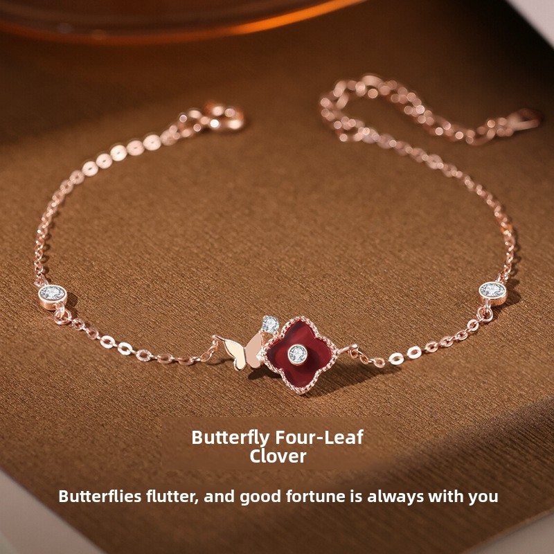 Original butterfly and four-leaf clover bracelet for women, made of sterling silver, in Korean style, featuring a rose gold and red agate design, a sophisticated and elegant piece of jewelry