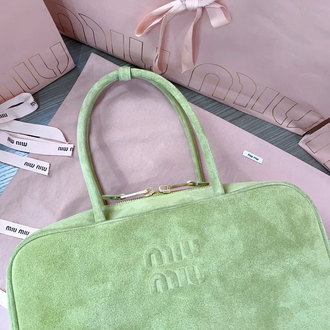 Miu Miu Canvas and Leather Crossbody Bag product photo from LabelPicks