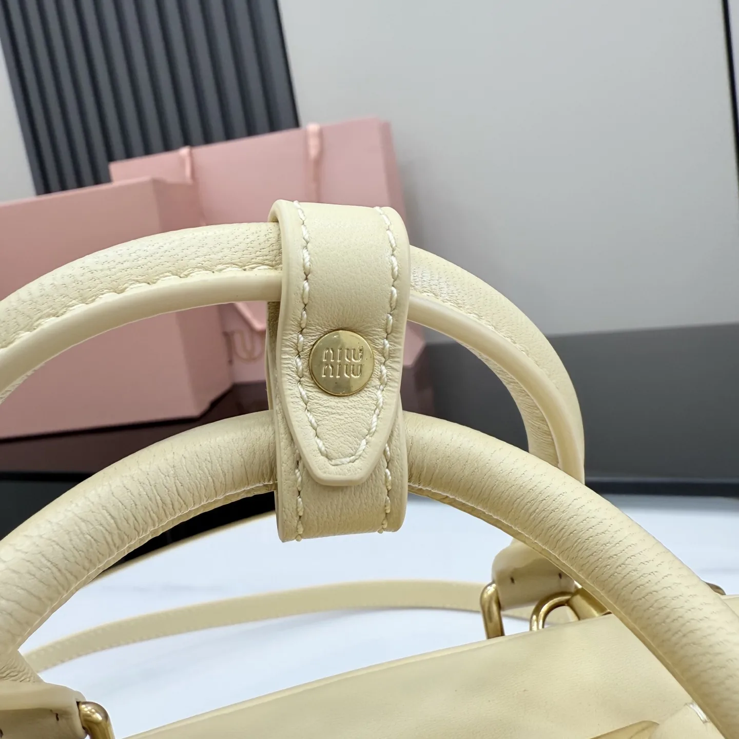 Miu Miu Lambskin Matelasse Top Handle Bag product photo from LabelPicks