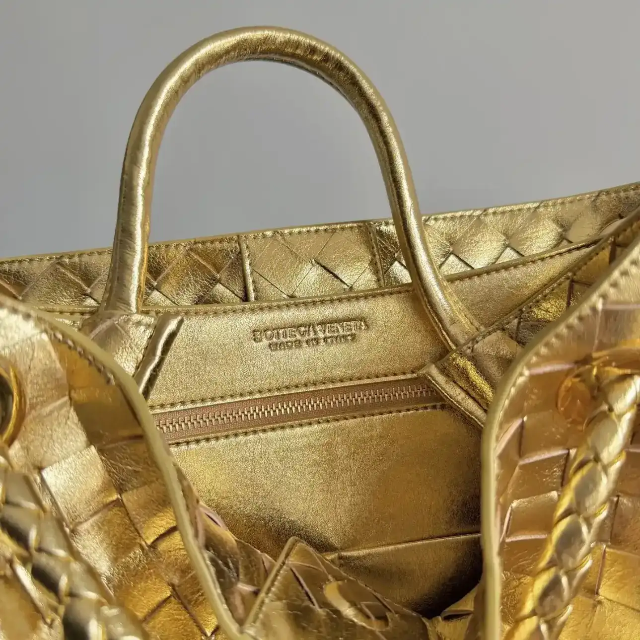 Bottega Veneta Gold Andiamo Intrecciato Woven Leather Top Handle Bag product photo from LabelPicks