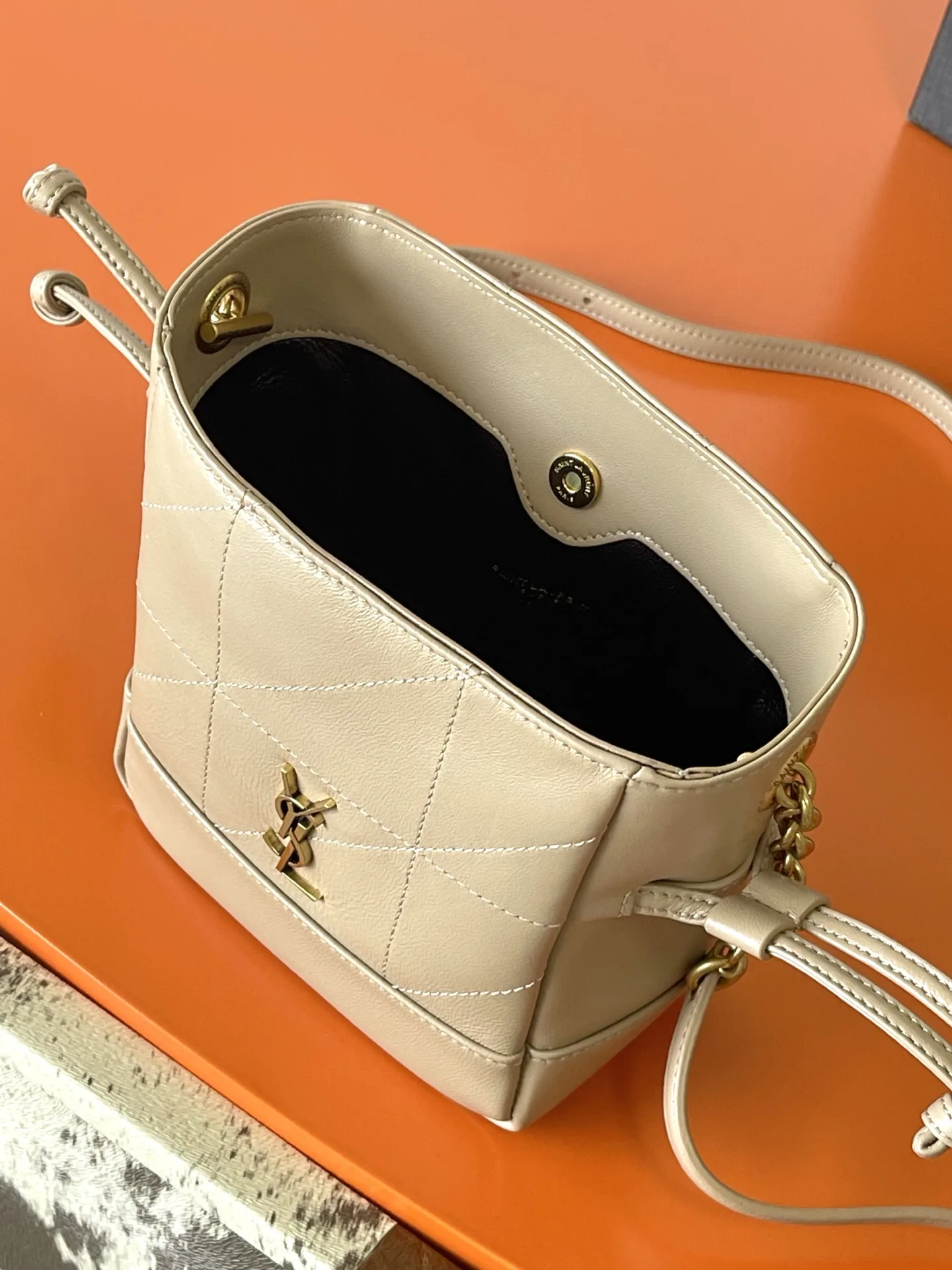 Saint Laurent Jamie Beige Lambskin Bucket Bag product photo from LabelPicks