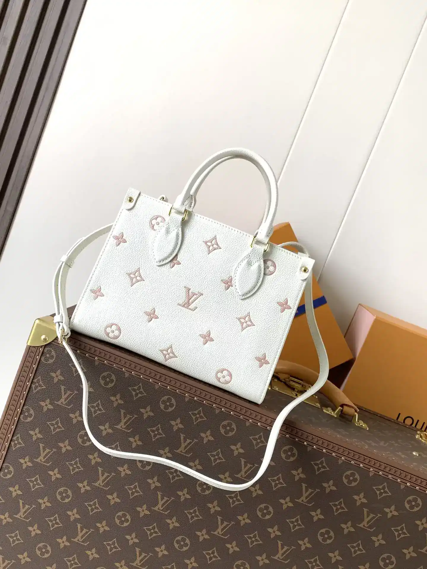 Louis Vuitton White Onthego Calfskin Top Handle Bag product photo from LabelPicks