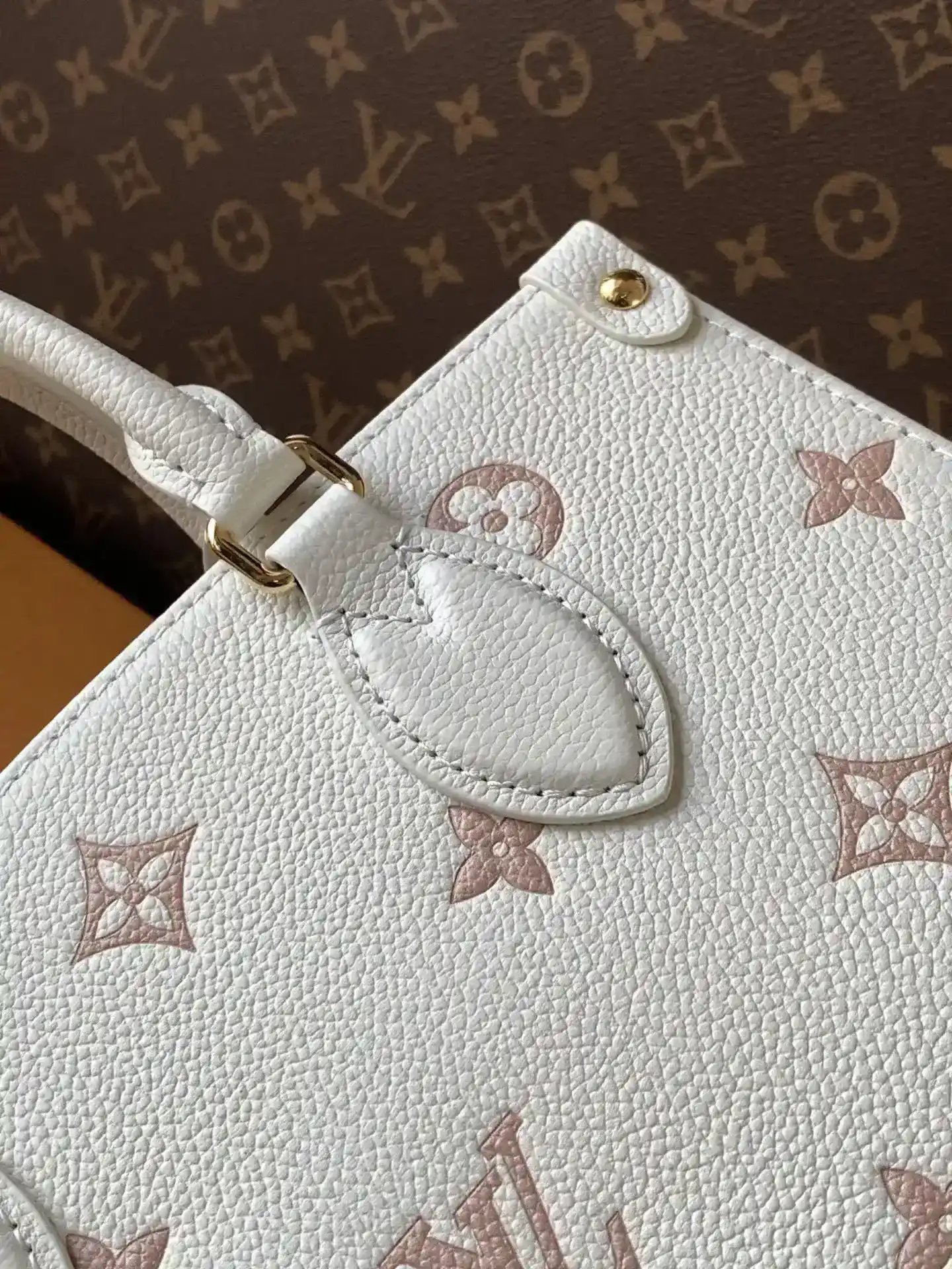 Louis Vuitton White Onthego Calfskin Top Handle Bag product photo from LabelPicks