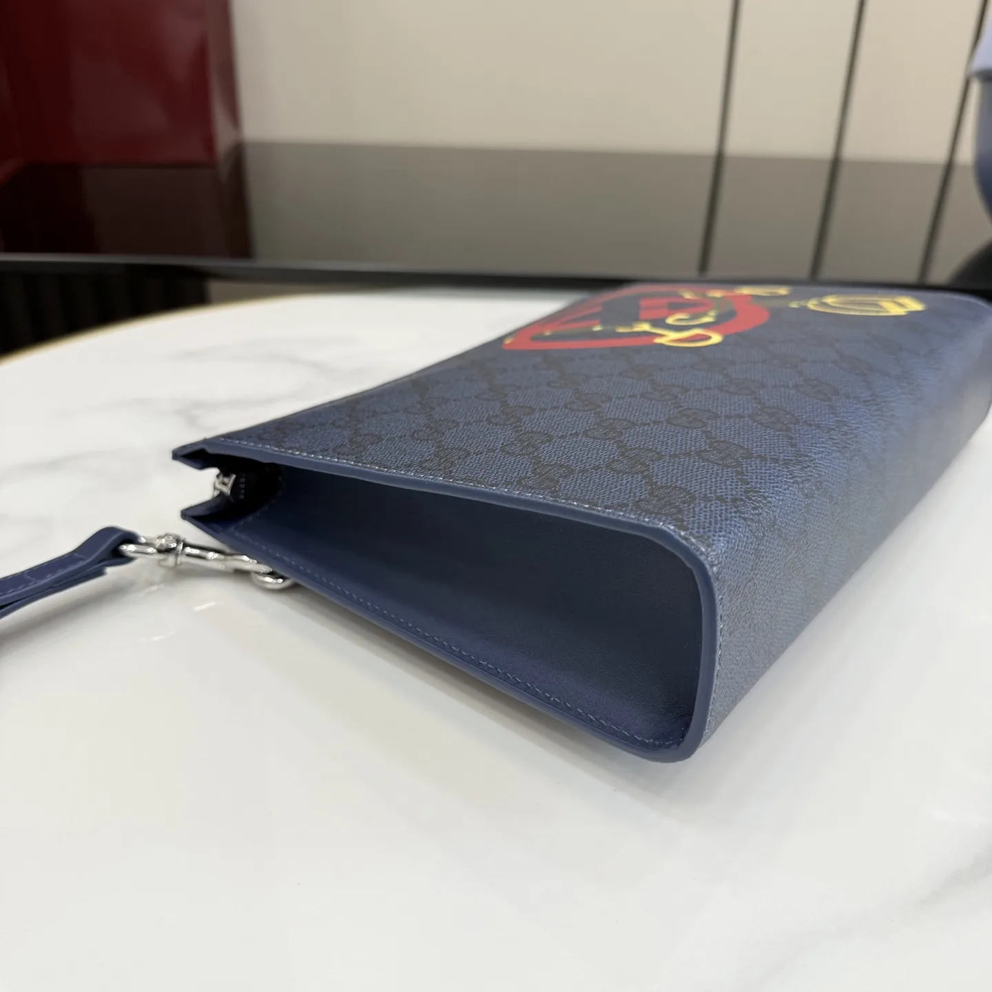 Gucci Navy GG Supreme Canvas Clutch product photo from LabelPicks