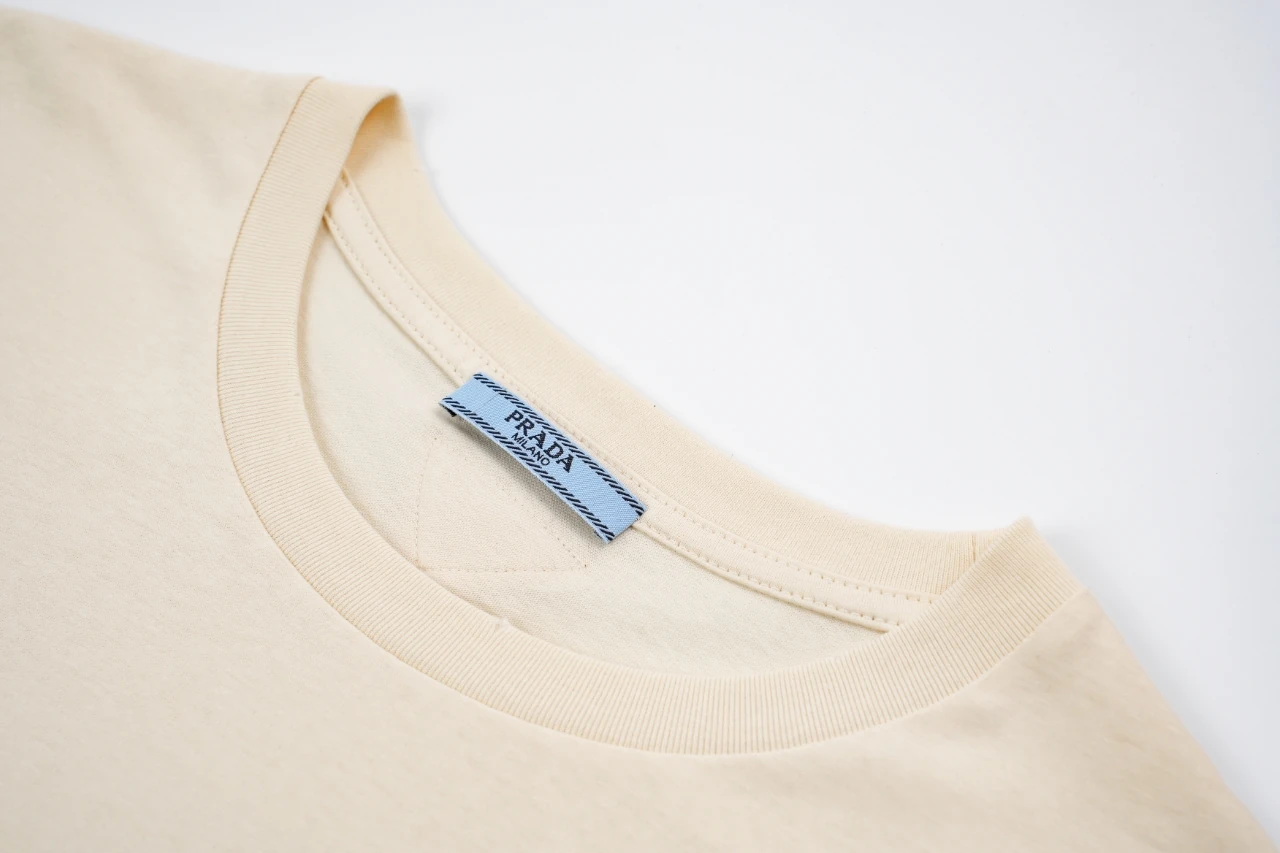 Prada Off-White Distressed Small Logo Triangle T-Shirt product photo from LabelPicks