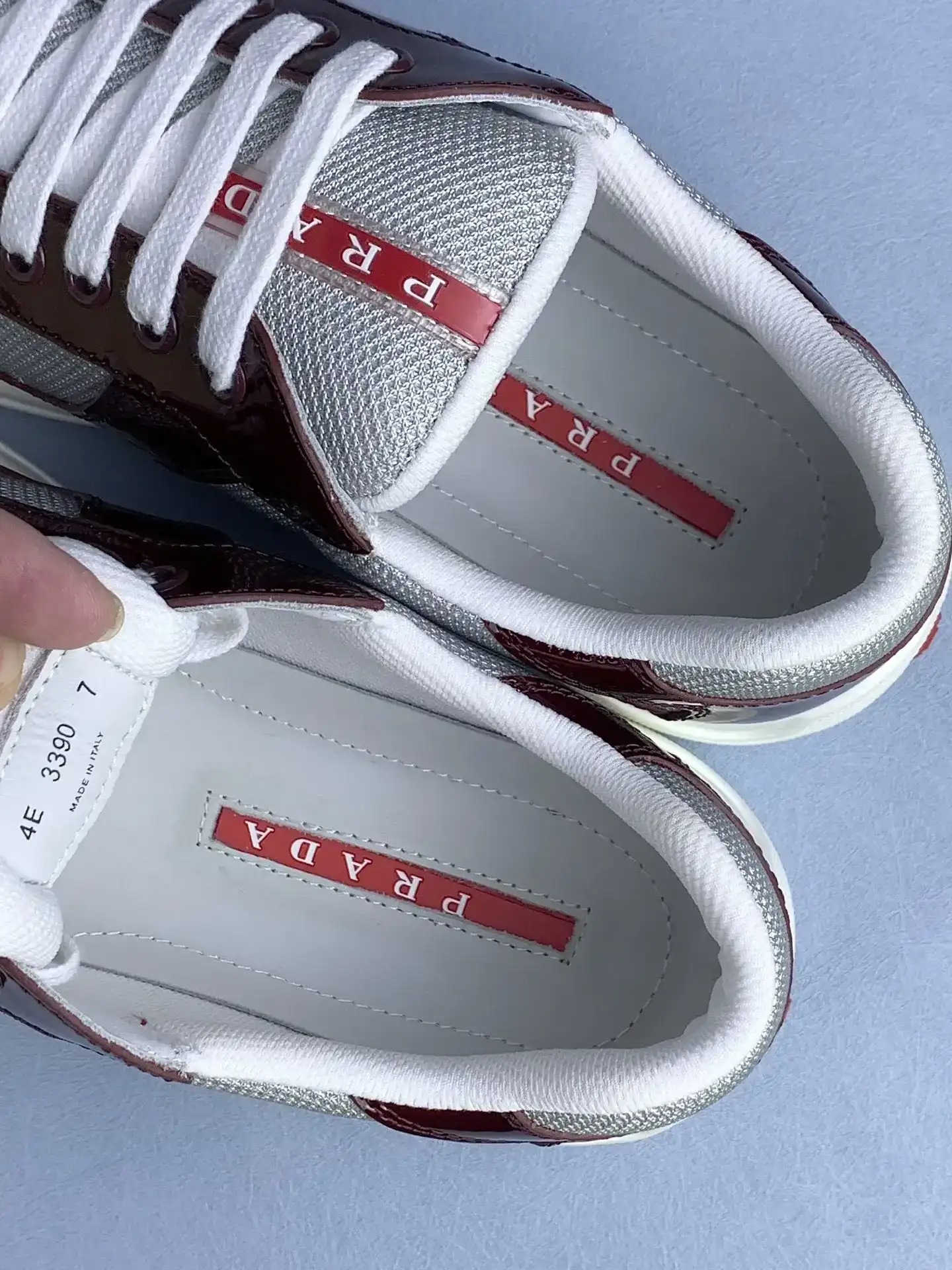 Patent leather and technical fabric Prada America's Cup sneakers product photo from LabelPicks