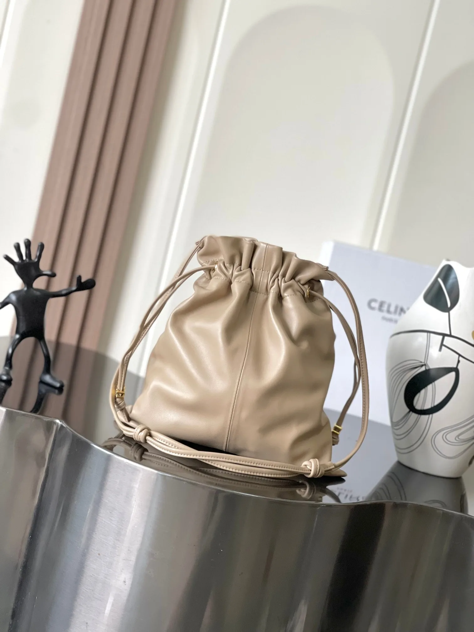Celine Lambskin Triomphe Bucket Bag product photo from LabelPicks