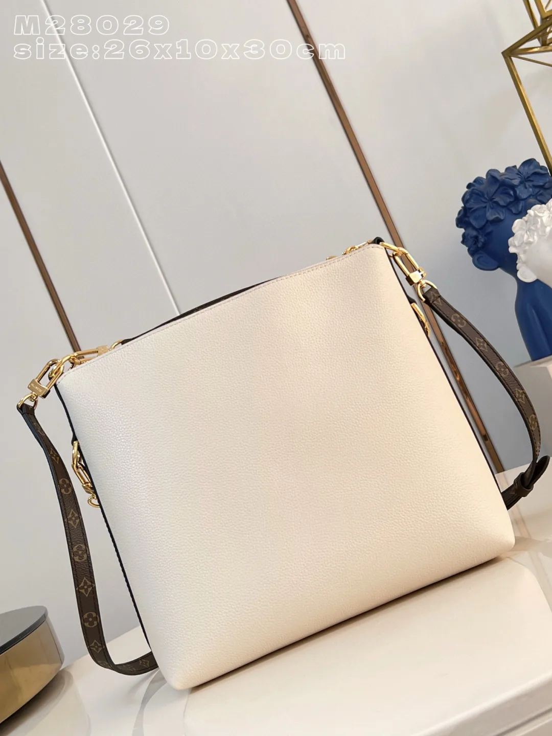 Louis Vuitton Woven Leather Shoulder Bag product photo from LabelPicks