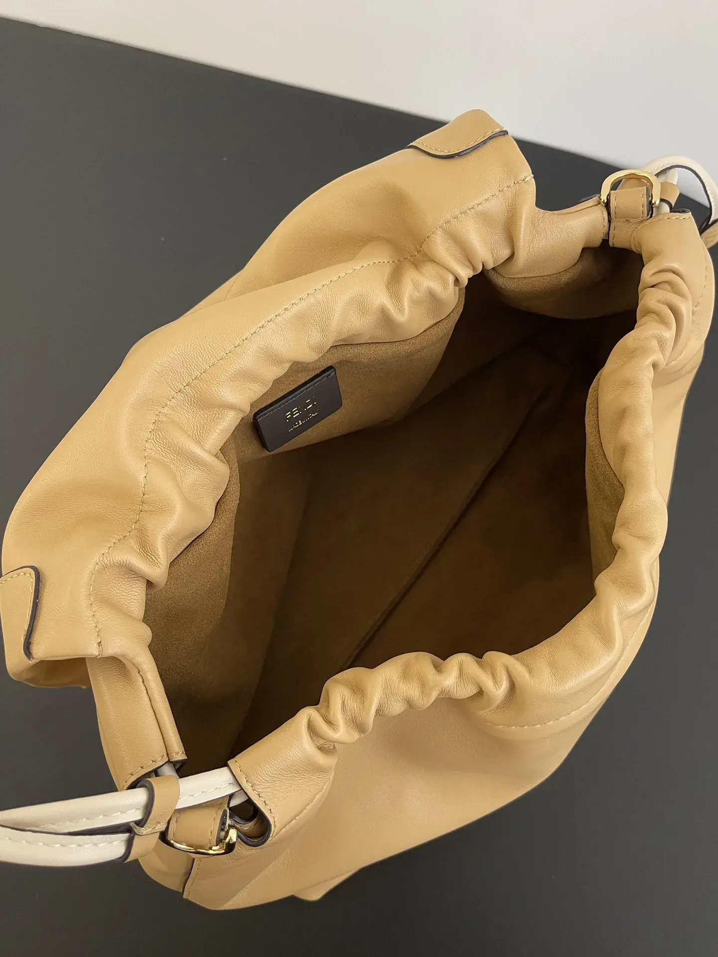Fendi Baguette Beige Lambskin Bucket Bag product photo from LabelPicks