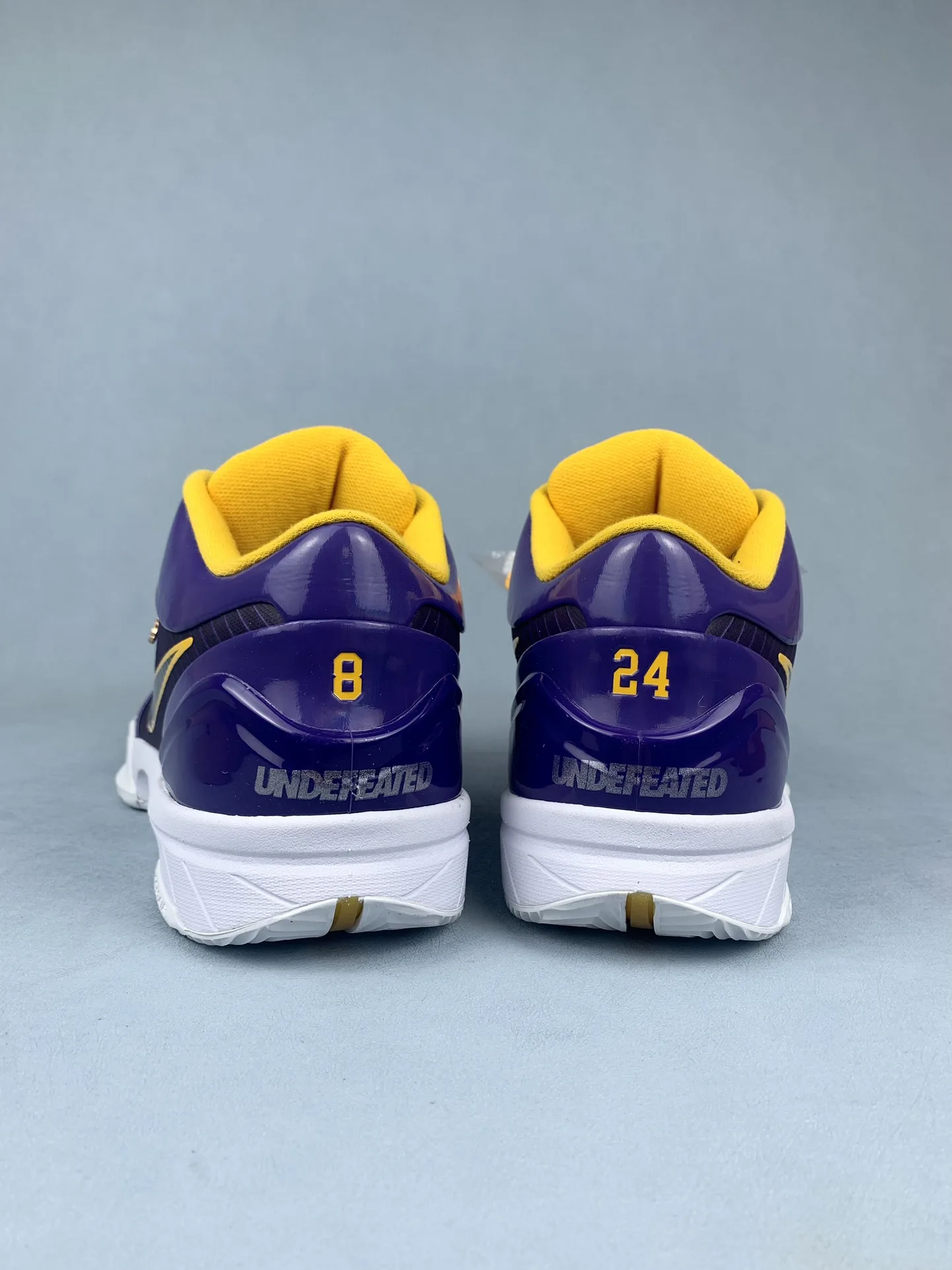 UNDEFEATED x Kobe 4 Protro “Lakers” Basketball Shoes product photo from LabelPicks