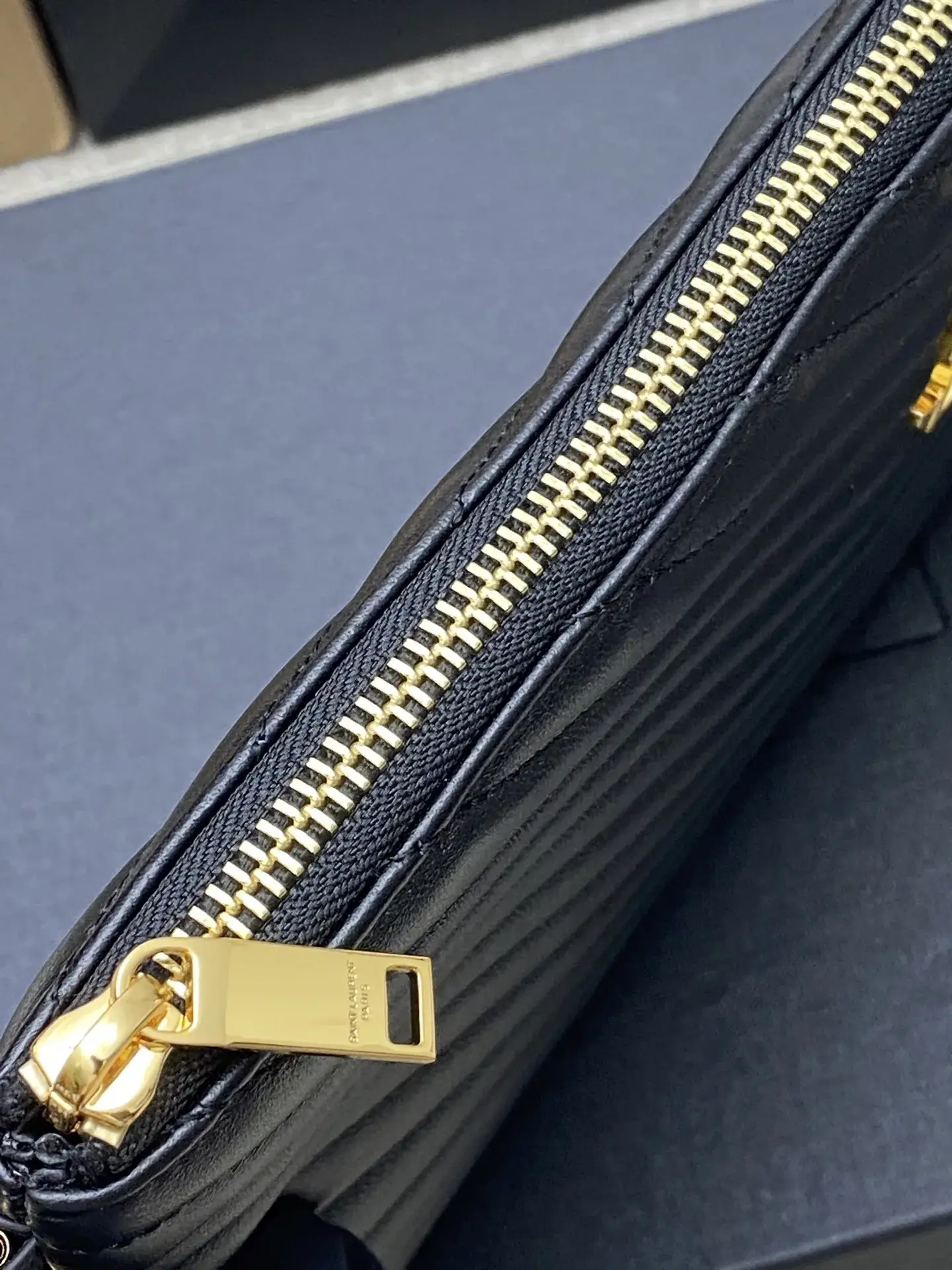Saint Laurent Quilted Leather Clutch product photo from LabelPicks