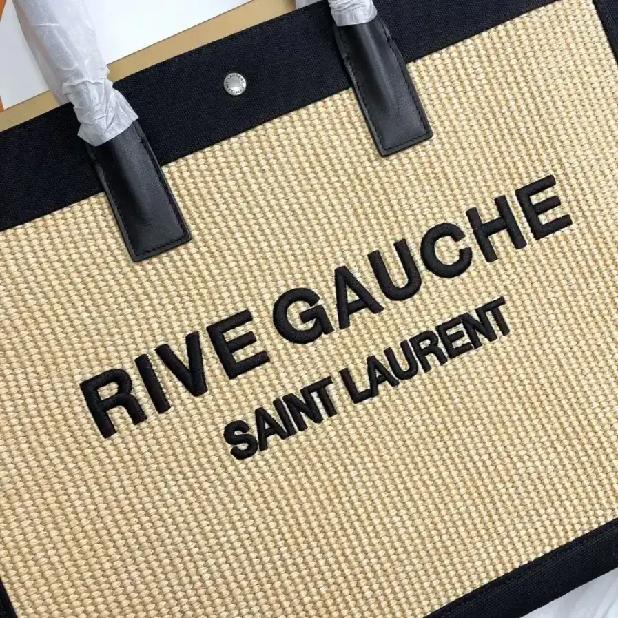 Saint Laurent Woven Leather Tote Bag product photo from LabelPicks