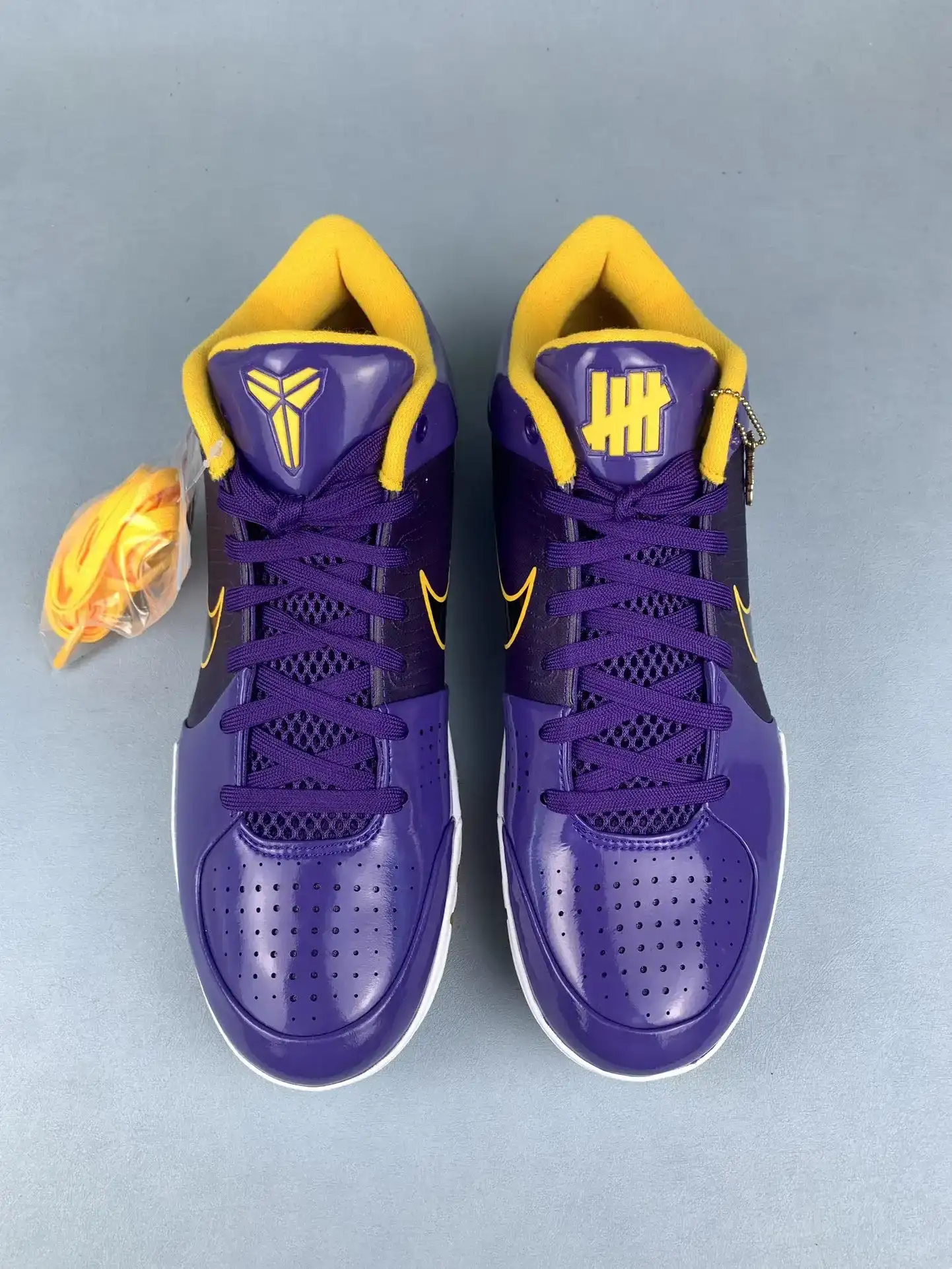 UNDEFEATED x Kobe 4 Protro “Lakers” Basketball Shoes product photo from LabelPicks